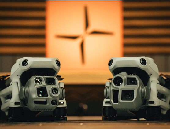Close-up of two advanced commercial drones with cameras at AlphaGeo Ltd store, Oxfordshire UK