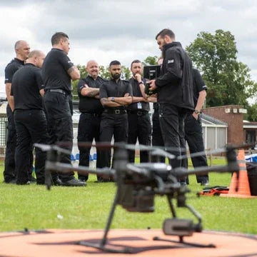 Group training with commercial drone outdoors, AlphaGeo Ltd, drone and survey equipment